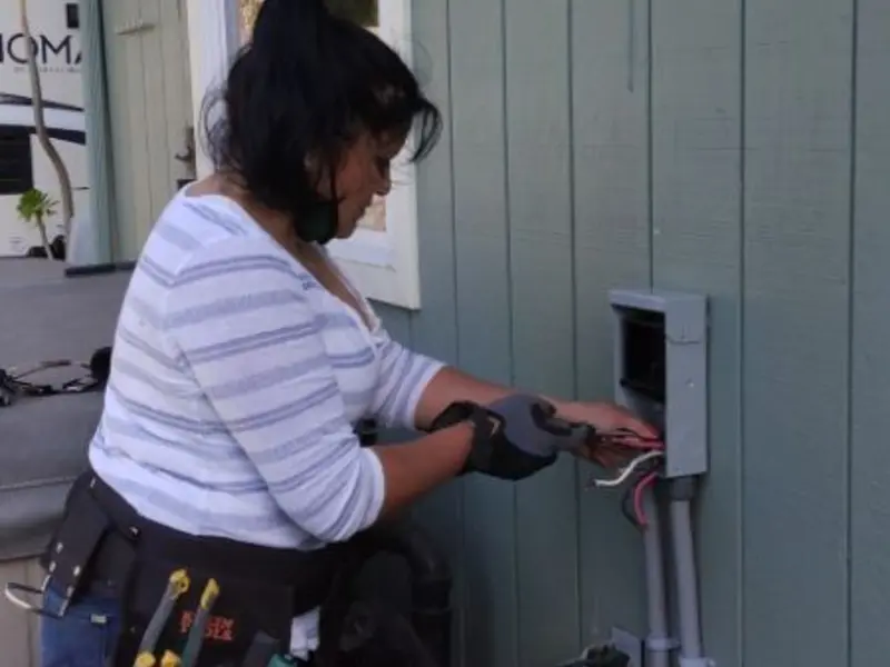 Licensed electrician wiring an exterior subpanel in Calumet Park